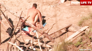 Italian smoking nudist couple