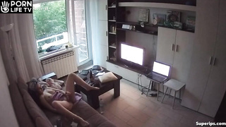 Young German girl masturbates on her couch