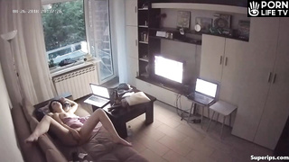 Young German girl masturbates on her couch