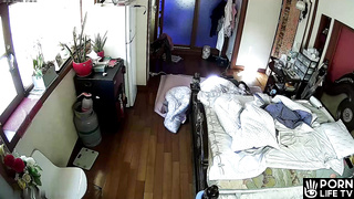 Mature Japanese couple fucks in their bed