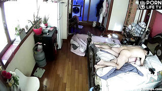 Mature Japanese couple fucks in their bed