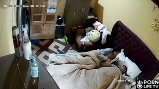 Young Spanish parents fuck in their bed