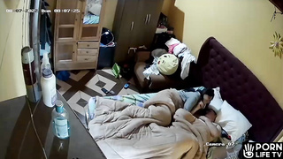 Young Spanish parents fuck in their bed