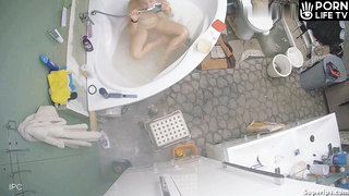 Ukrainian girl masturbates in the bathtub