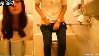 Young Asian girl visits a public restroom