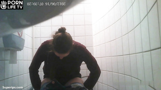 Cute student girls use toilet