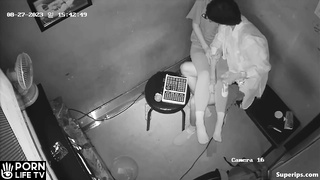 Young Korean couple kissing at karaoke