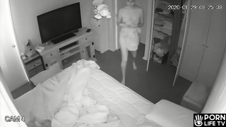 Gorgeous European mom gets dressed in her room