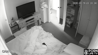 Gorgeous European mom gets dressed in her room