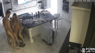 European couple has sex in the kitchen