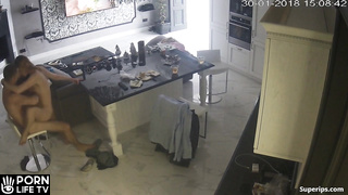 European couple has sex in the kitchen