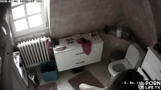 Russian woman masturbates in the toilet