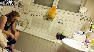 ﻿The routine of a German mother in the bathroom