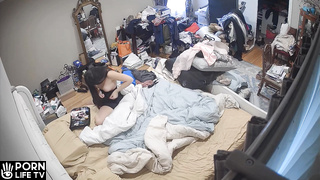 Teen American changes her clothes in her parents’ room