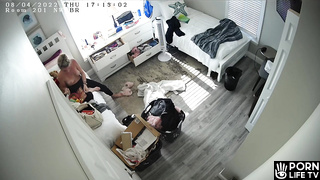 British college girl gets dressed in her room