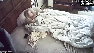 American blonde girl masturbates on her parents bed