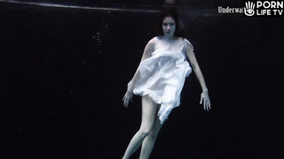 Dark pool vibes with white dress girl