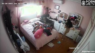 Busty Latina girl gets dressed in her room