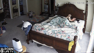 Mature Asian couple fucks in their bed