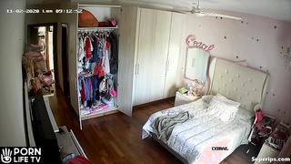 ﻿Petite Latina girl gets dressed in her room