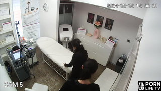 Lesbian mother gets wet while waxing her hairy pussy in Canadian beauty salon