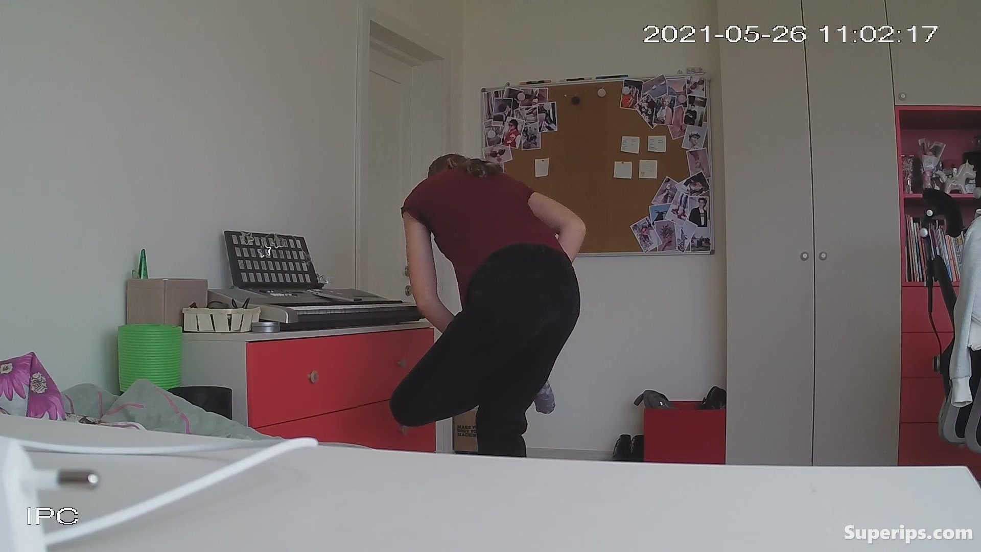 Tall German girl is changing clothes in her room
